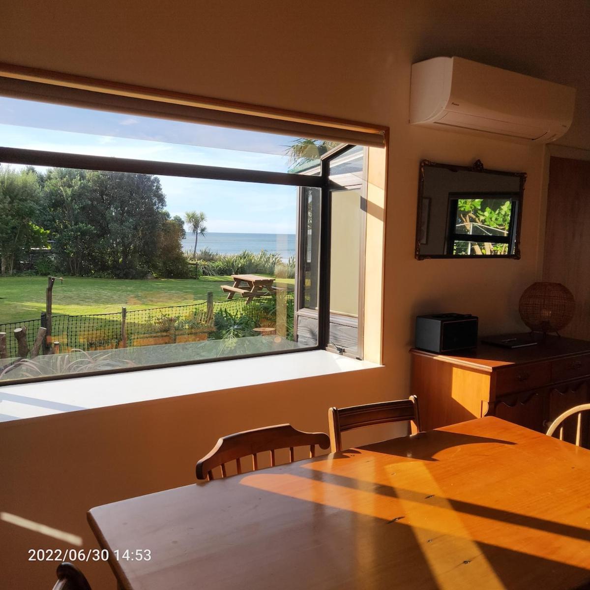 Beachfront Bliss - Your Parapara Seaside Retreat Екстериор снимка