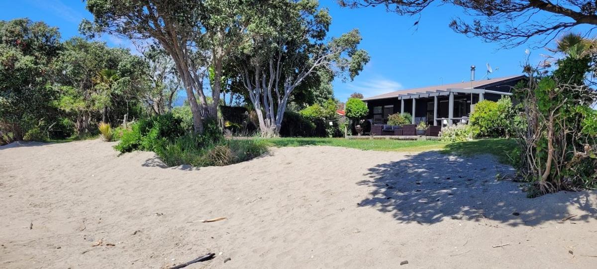 Beachfront Bliss - Your Parapara Seaside Retreat Екстериор снимка