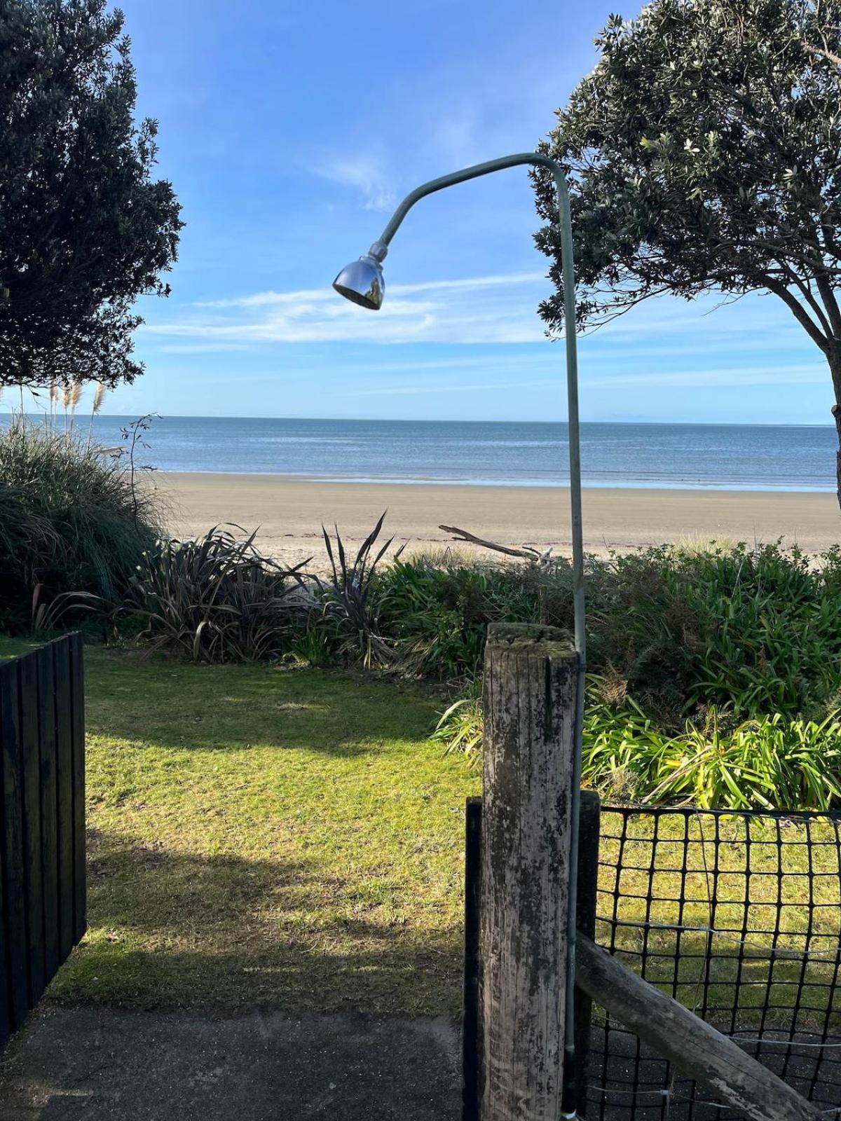 Beachfront Bliss - Your Parapara Seaside Retreat Екстериор снимка